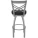 A Holland Bar Stool stainless steel outdoor counter stool with black cushion and backrest.