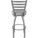 A Holland Bar Stool stainless steel outdoor counter stool with a ladder backrest and a Breeze Sidewalk seat.
