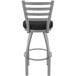 A Holland Bar Stool stainless steel outdoor bar stool with a black cushion and ladderback.