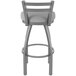 A gray Holland Bar Stool with a low back and a Breeze Sidewalk seat.