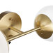 Two brass Globe Modern Glam wall sconces with frosted glass balls.