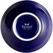 A cobalt blue Tuxton nappie bowl with white text on the inside.