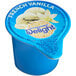 A blue and white International Delight French Vanilla creamer container with a logo.
