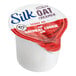 A case of 192 Silk Oat Milk Oatmeal Cookie non-dairy creamers with a white and red container and label.