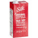 A red carton of Silk soy milk with a label.