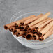 A bowl of McCormick Culinary Cinnamon Sticks.