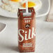 A brown carton of Silk Chocolate soy milk.