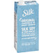A blue carton of Silk Vanilla soy milk with white text on a white background.