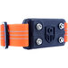 An orange and black rectangular traction cleat with silver bolts.