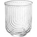 A clear Acopa Zelda double old fashioned glass with a curved design.
