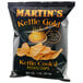 A Martin's Kettle Gold Potato Chips bag.