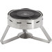 A round stainless steel waterless chafer with brushed stainless steel legs and a black lid.
