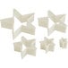 A set of 4 white star-shaped cookie cutters.