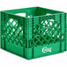 A green plastic Choice milk crate with holes.