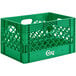 A green rectangular plastic milk crate with handles.
