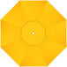 A yellow California Umbrella canopy with a white center and a hole in the center.