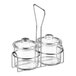 A metal wire condiment caddy holding two clear glass jars with lids.