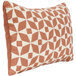 An Astella peach and white throw pillow with a geometric pattern.