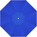 A blue sunbrella canopy with a white circle in the center.