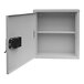 A light gray metal Omnimed patient security cabinet with a black lock.