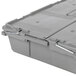 A close-up of a gray plastic Vollrath Tote 'N Store buffetware box with two latches.