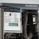 A Scotsman Prodigy Elite air cooled ice machine with a close-up of the machine.