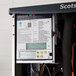 A Scotsman Prodigy Elite air cooled ice machine with a plastic storage bin.