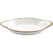 A white oval melamine side dish with a brown speckled rim.