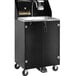 A black Paragon Pro Series portable hand sink with a stainless steel sink and cabinet on wheels.
