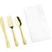 A Visions heavy weight gold plastic cutlery set with white napkin in a white pocket fold.