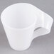 A white plastic Fineline Tiny Tonics cup with a handle.