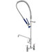 A chrome Waterloo pre-rinse faucet with a blue hose and handle.