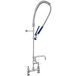 A Waterloo chrome pre-rinse faucet with a blue hose and handle.