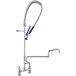 A Waterloo chrome pre-rinse faucet with a curved hose and blue handle.