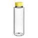A clear plastic cylinder bottle with a yellow cap.