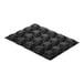 A black square Silikomart silicone baking mold with 20 square holes in it.