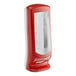 A red and white Tork Xpressnap interfold napkin dispenser with a glass door.