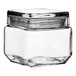 An Acopa clear glass jar with a lid.