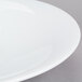 A CAC super bright white porcelain bowl with a rim.