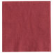 A close-up of a red Choice Burgundy 2-ply customizable beverage/cocktail napkin with a white border.