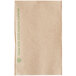 A brown paper dispenser napkin with green writing on it.