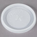 A white Cambro plastic lid with a cross.