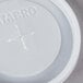 A white plastic Cambro lid with text reading "Cambro"
