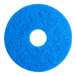 A blue Lavex Basics circular floor cleaning pad.