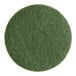 A green circular Lavex Basics floor machine pad.