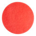 A red circle pad with white felt.