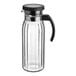 A clear polycarbonate pitcher with a black lid and handle.