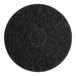 A black circular Lavex Basics stripping floor machine pad.