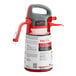 A red and grey SC Johnson Professional TruFill sprayer with a handle.