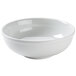 A Tuxton white porcelain serving bowl.
